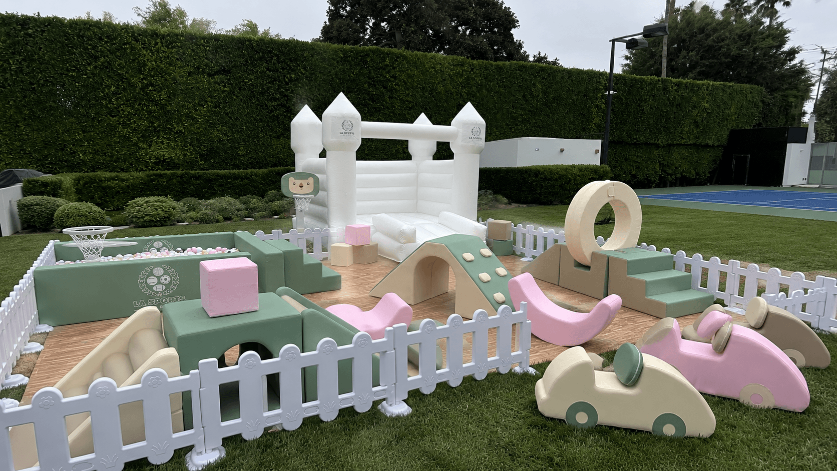 LA Sports World soft play course and bounce house set up outdoors